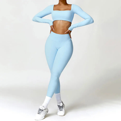 Person wearing a light blue athletic outfit on a white background